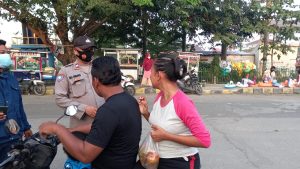 Kapolsek tambelang Dorong Masyarakat Selalu Pakai Masker