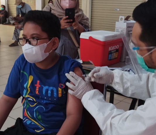Satpas SIM Cinere Tetap Eksis Adakan Vaksinasi Covid-19 Dilanjutkan Pembagian Masker